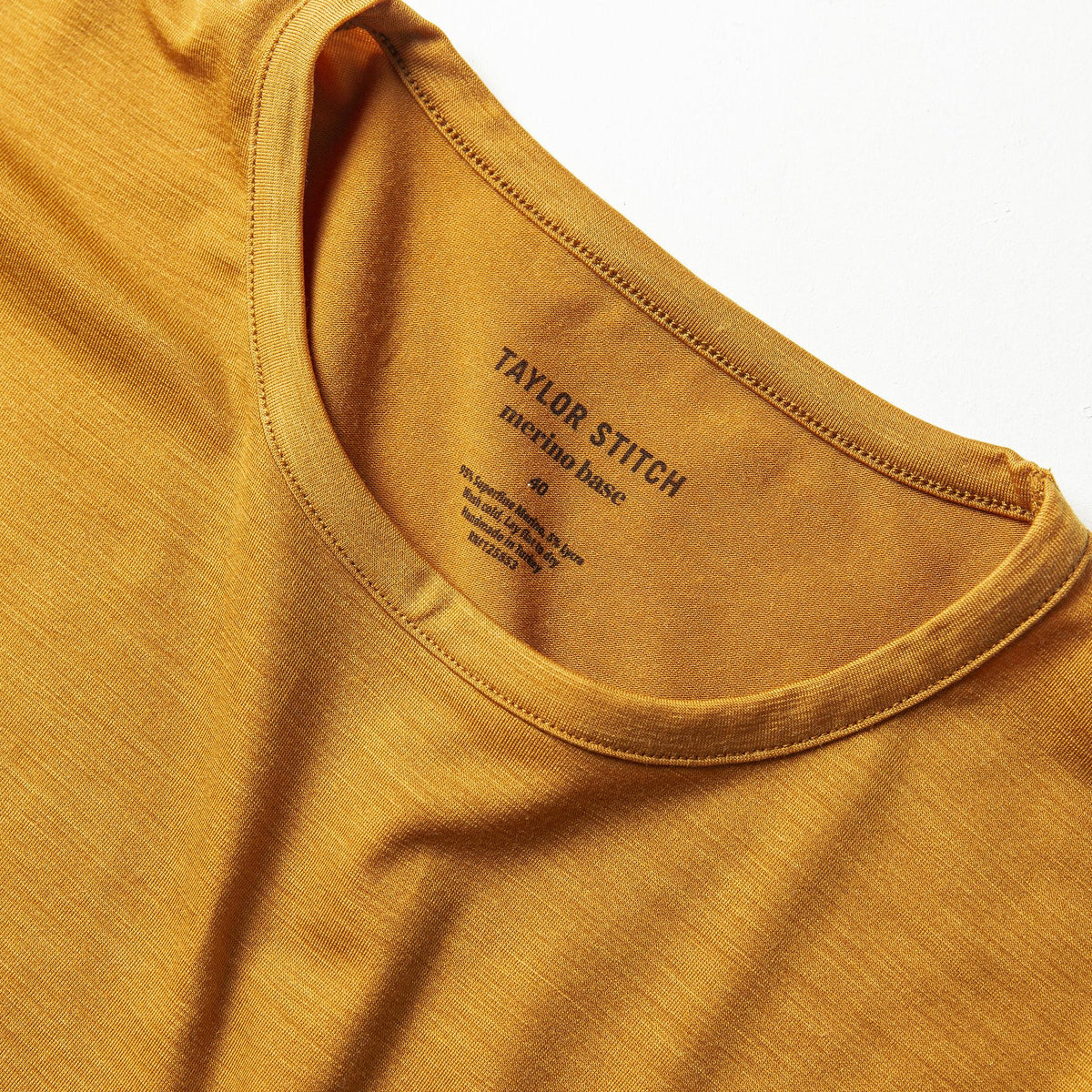 The Merino Tee in Heather Saffron