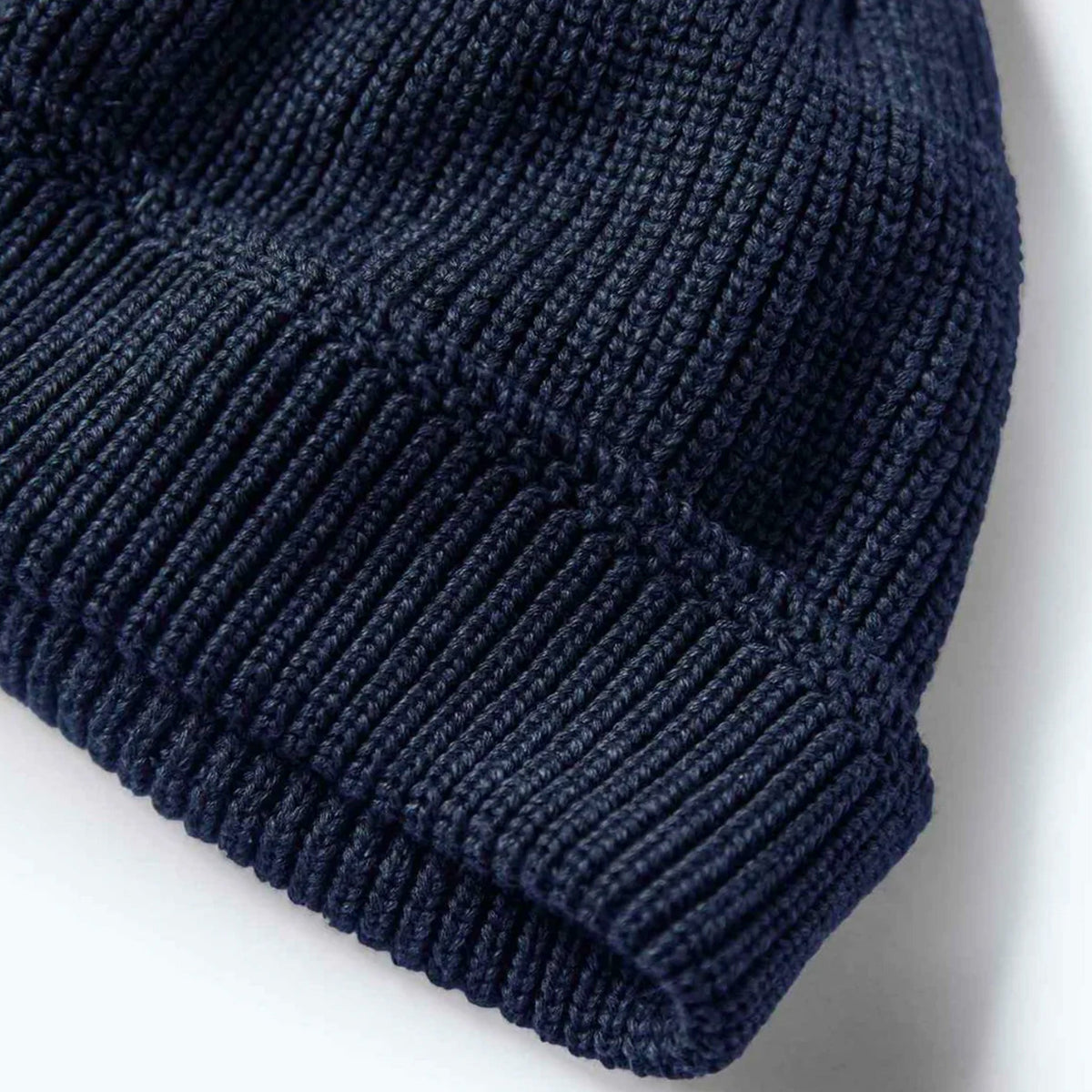 The Rib Beanie in Heather Navy