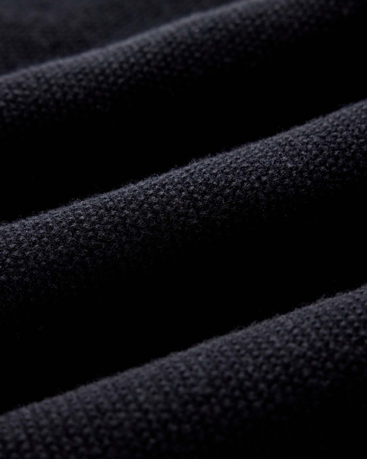 The Newton Sweater Polo in Midnight Merino