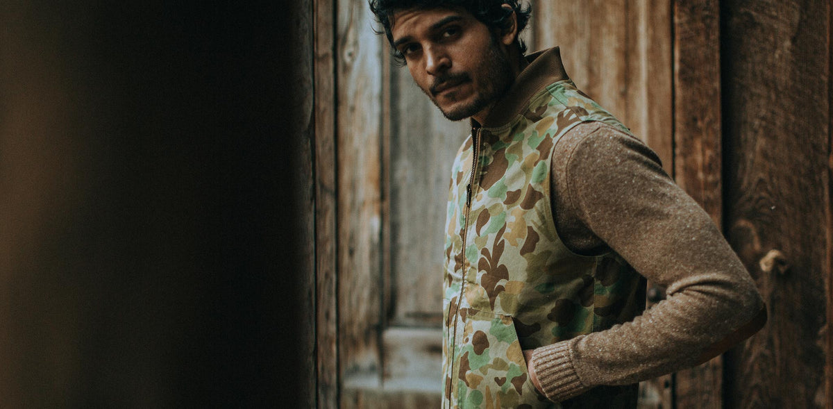 The Taylor Stitch x Gear Patrol Reversible Able Vest in Arid Camo