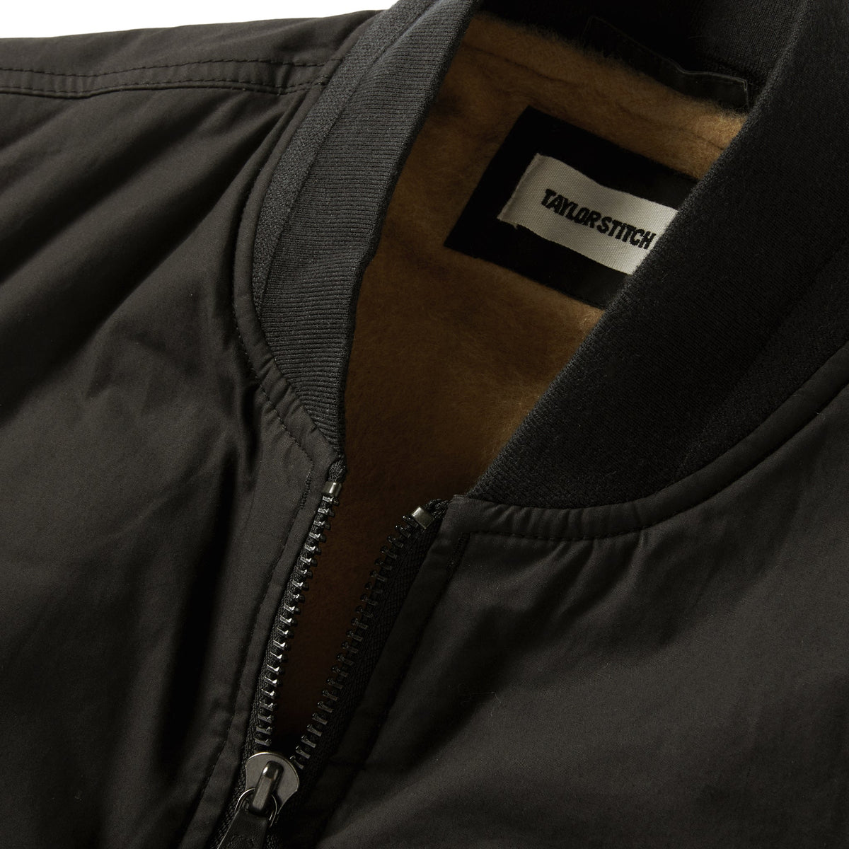 The Ignition Vest in Coal Dry Wax