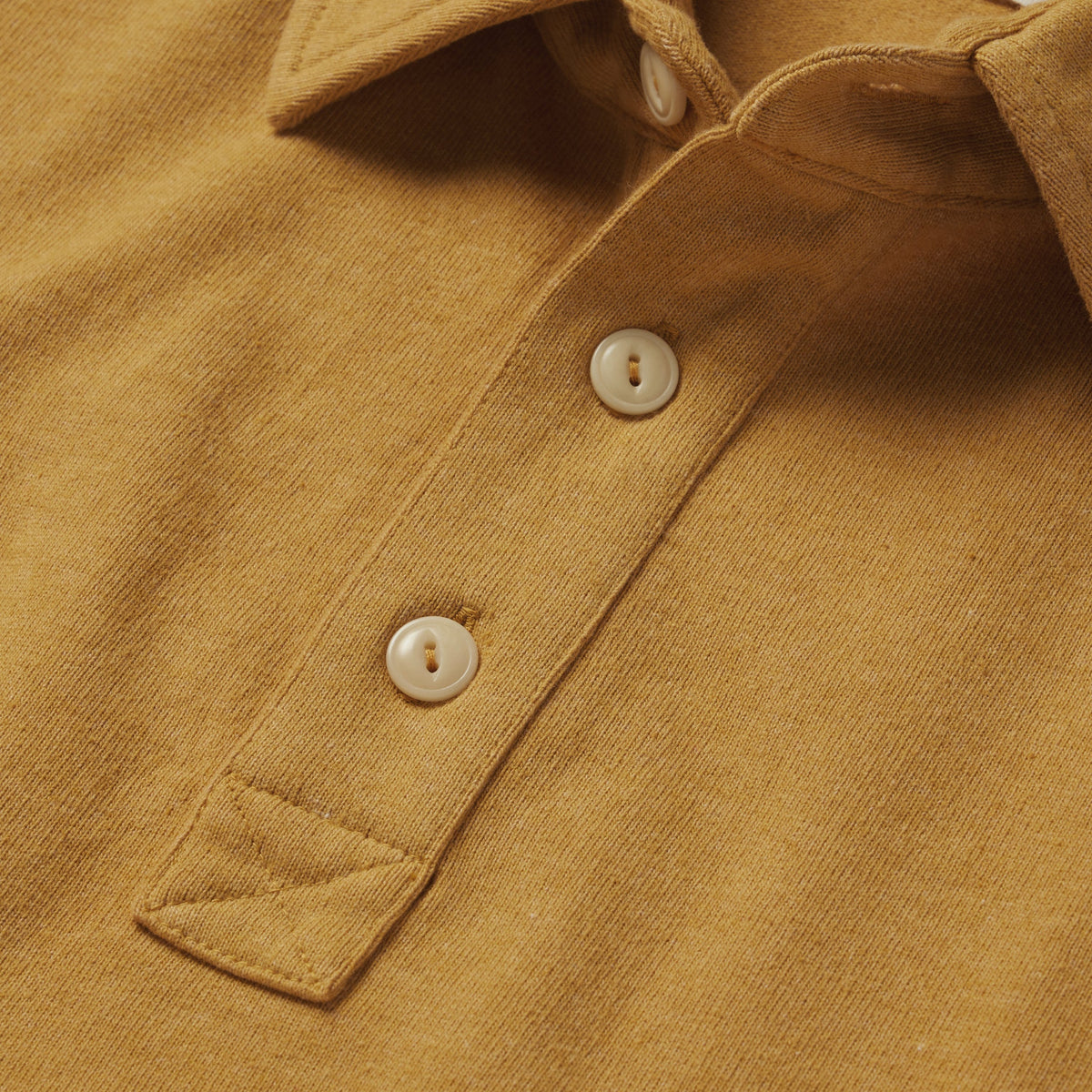 The Heavy Bag Polo in Gold