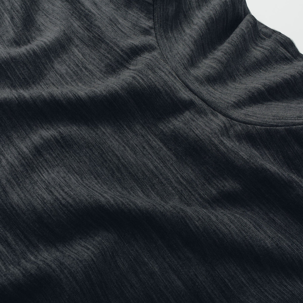 The Mercerized Merino Turtle Neck in Heather Black