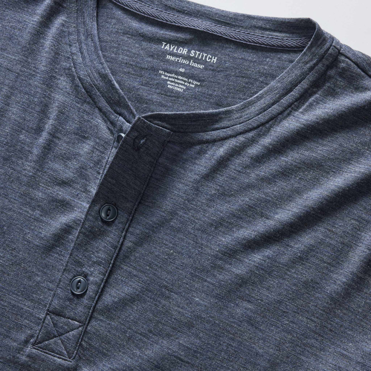 The Merino Henley in Heather Navy