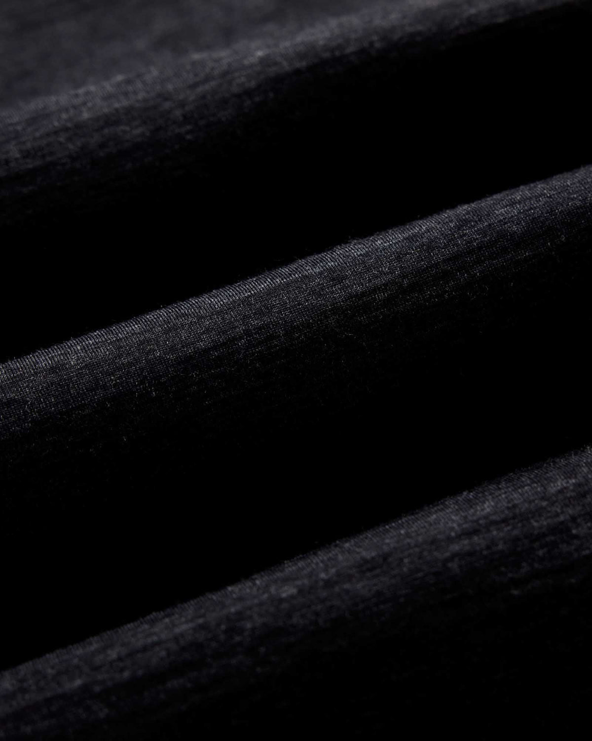 The Merino Long Sleeve Tee in Heather Black