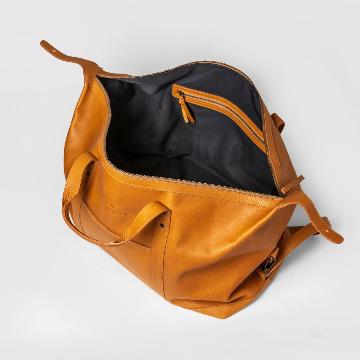 The Weekender Duffle Bag in Saddle Tan