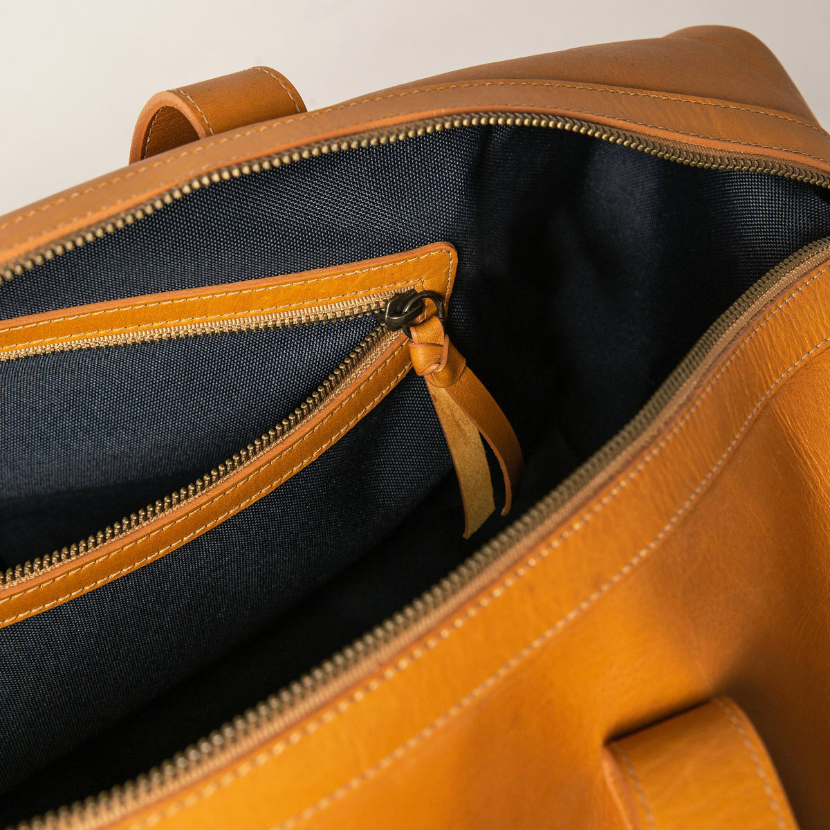 The Weekender Duffle Bag in Saddle Tan