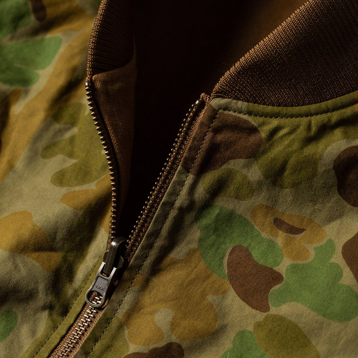 The Taylor Stitch x Gear Patrol Reversible Able Vest in Arid Camo